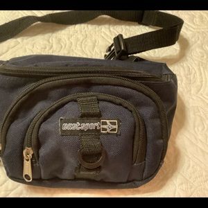 Eastsport navy camera bag or Fanny pack.